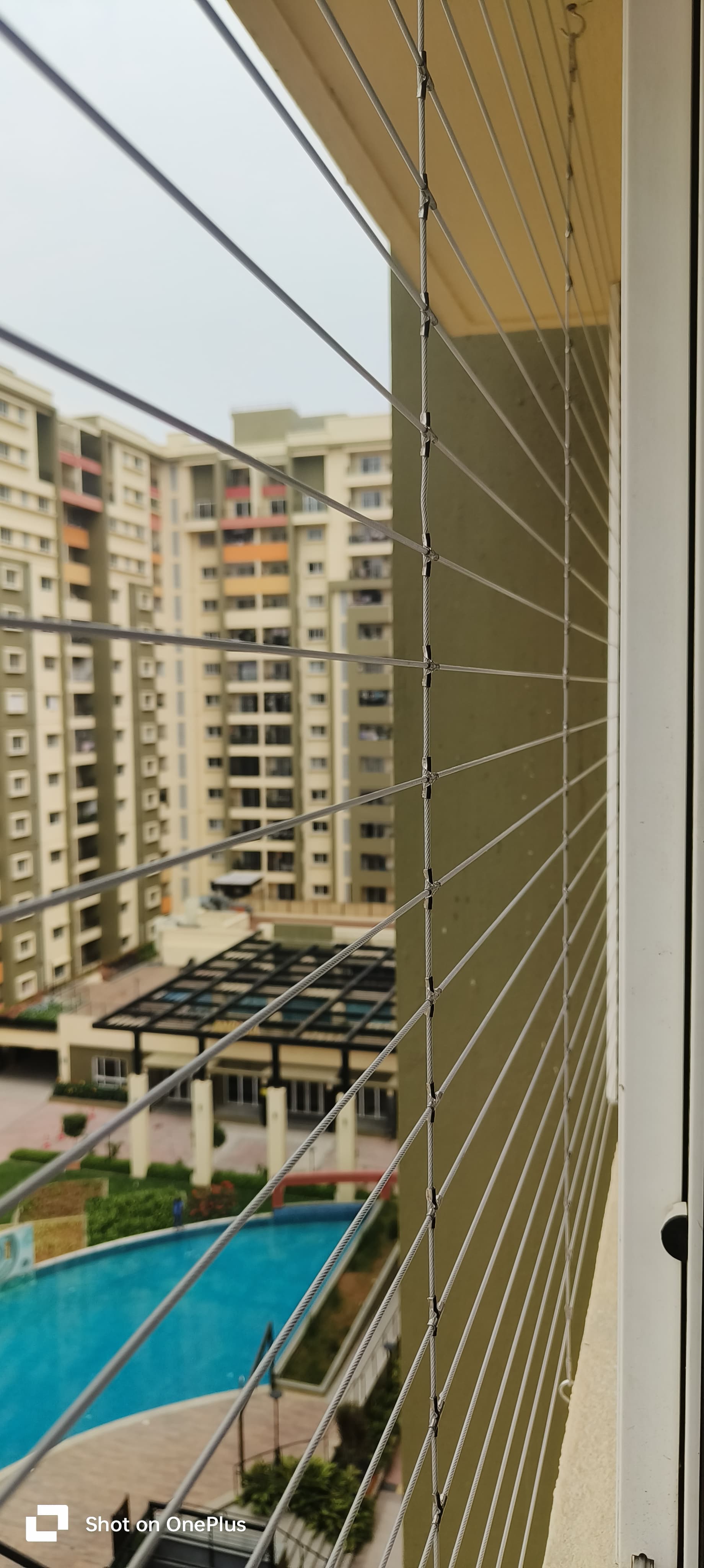 Balcony Invisible Grill installed by Pavitra Safety Nets Hyderabad